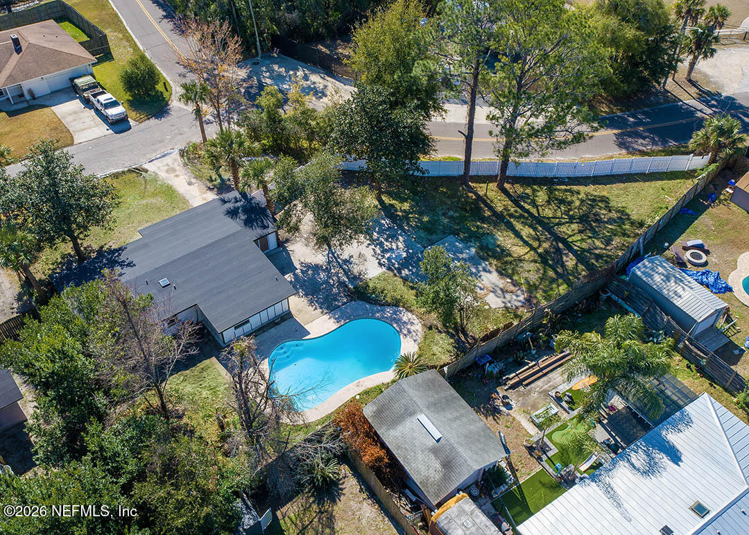 203 Rio Road Jacksonville, FL 32218 - Photo 3 of 27 an aerial view of a house with a yard basket ball court and outdoor seating