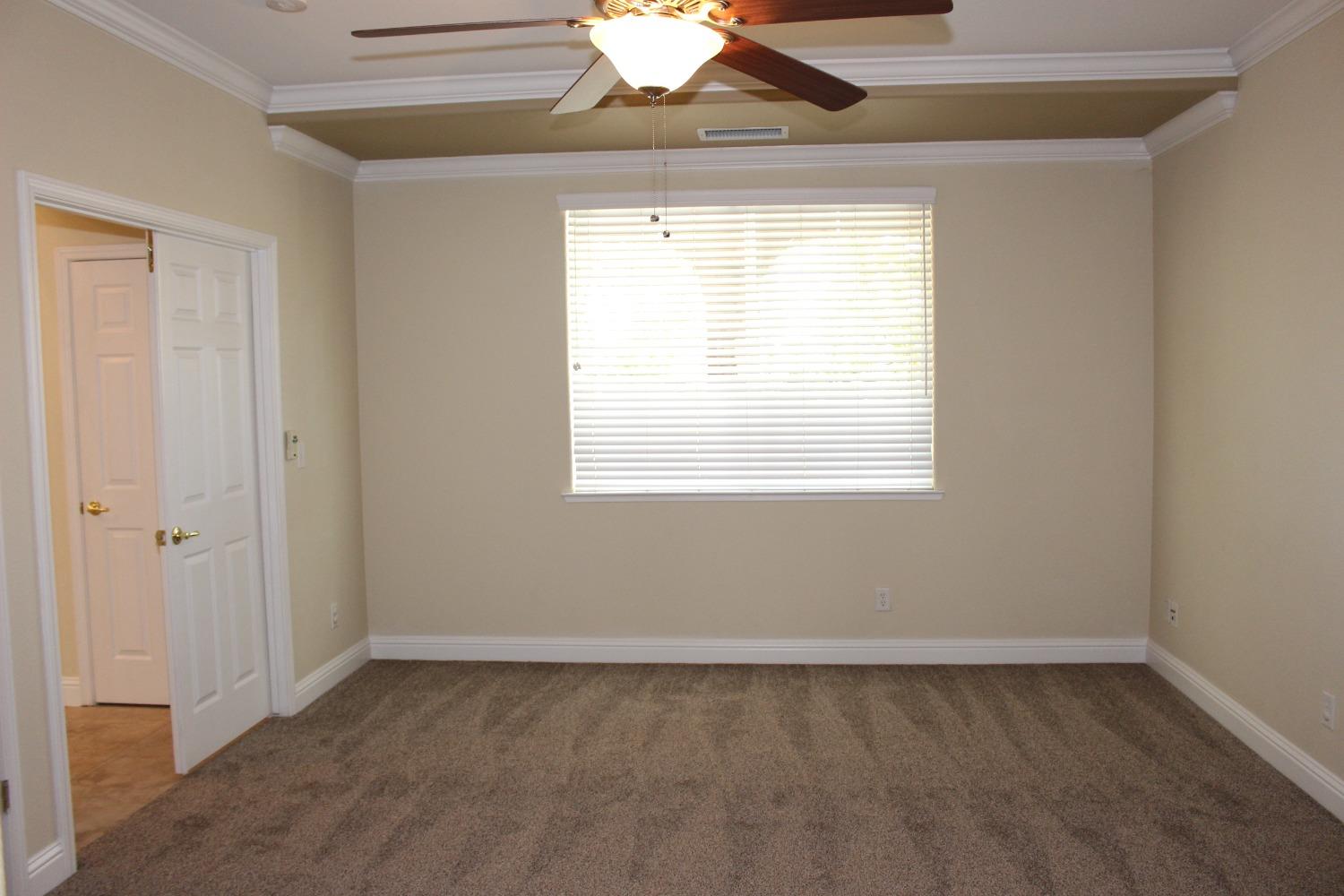 2478 Rall Avenue Clovis, CA 93611 - Photo 13 of 35 a view of an empty room with a window