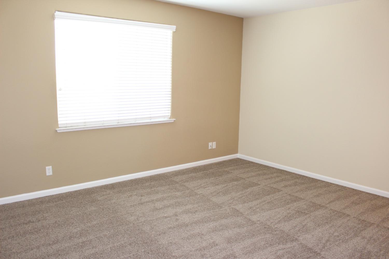 2478 Rall Avenue Clovis, CA 93611 - Photo 15 of 35 an empty room with a window