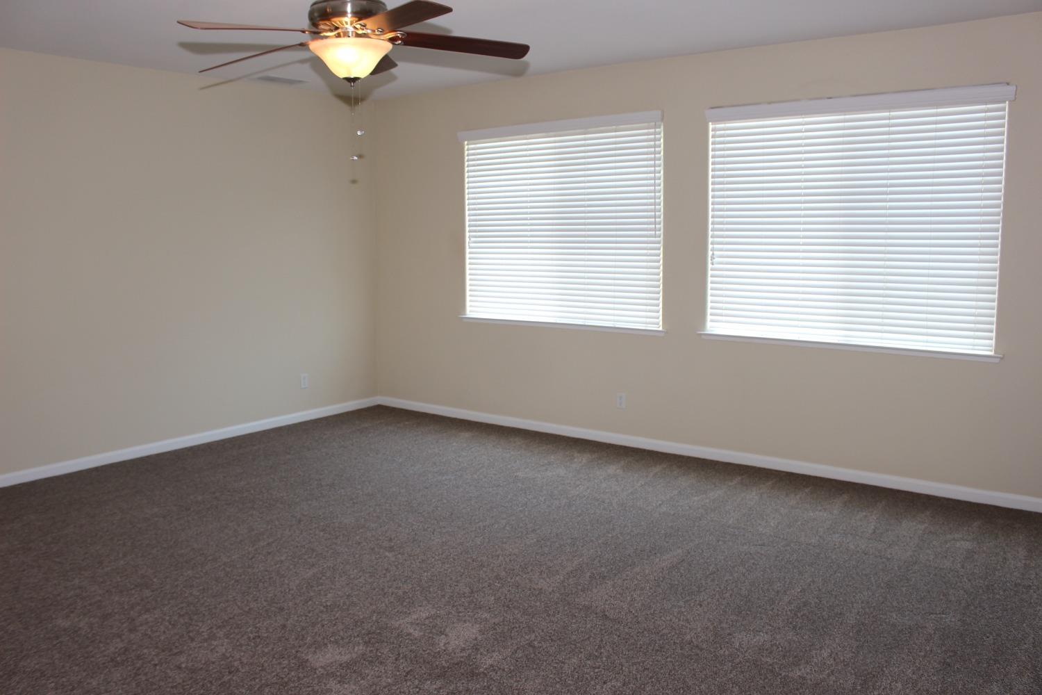 2478 Rall Avenue Clovis, CA 93611 - Photo 20 of 35 an empty room with a window