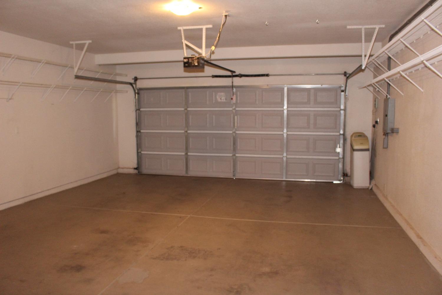 2478 Rall Avenue Clovis, CA 93611 - Photo 28 of 35 a view of a room with racks on the wall