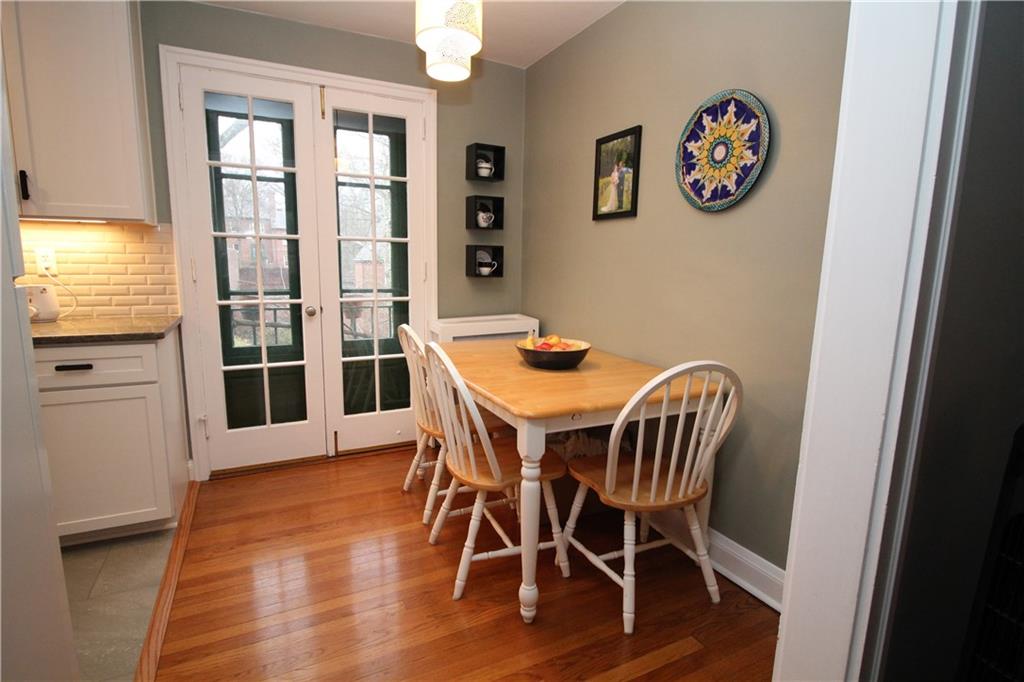 542 Bigham Road Pittsburgh, PA 15211 - Photo 9 of 25 The dining room features French doors leading to a Juliet balcony.