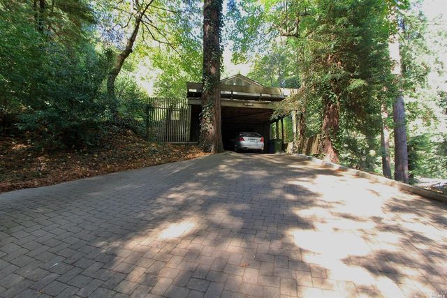 a view of empty room with trees