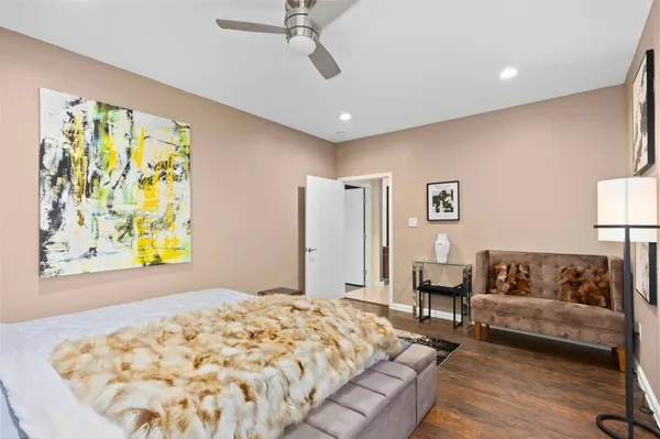 a bed room with a bed and a couch