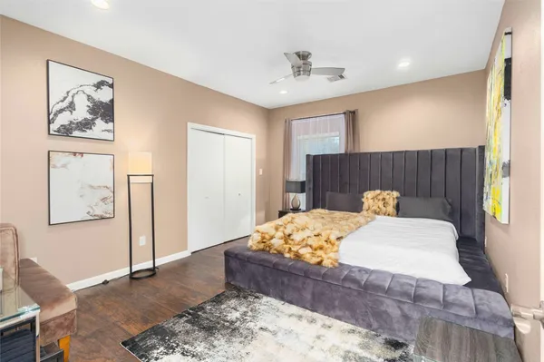 a bed room with a bed and a couch