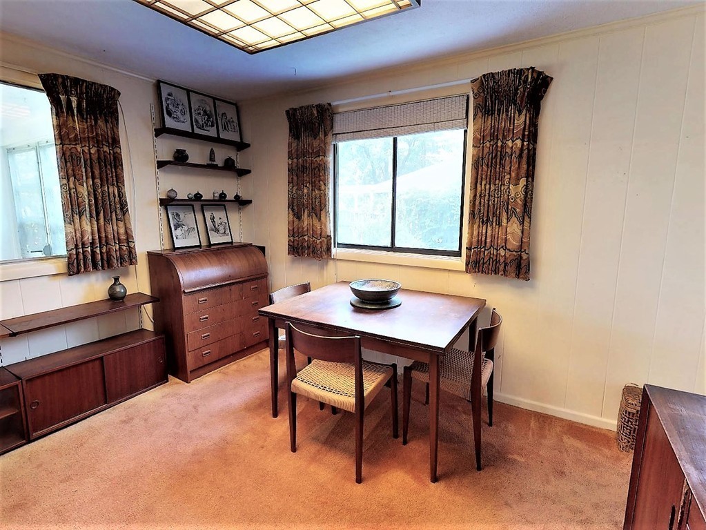 63 Lakeshore Road Natick, MA 01760 - Photo 14 of 30 a room with furniture and window