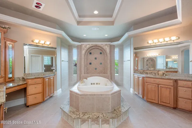 a kitchen with kitchen island a large counter top space and appliances