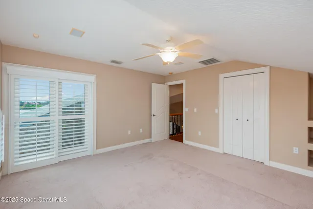 swimming pool view with a seating space