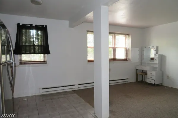 wooden floor and window in a room