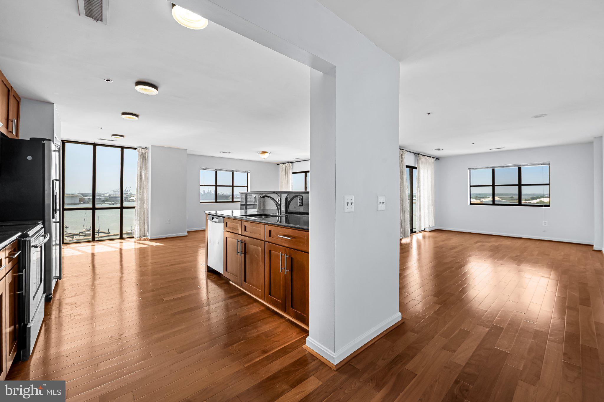 2702 Lighthouse Point East, Unit 738 Baltimore, MD 21224 - Photo 5 of 33 Spacious modern living with stunning views.