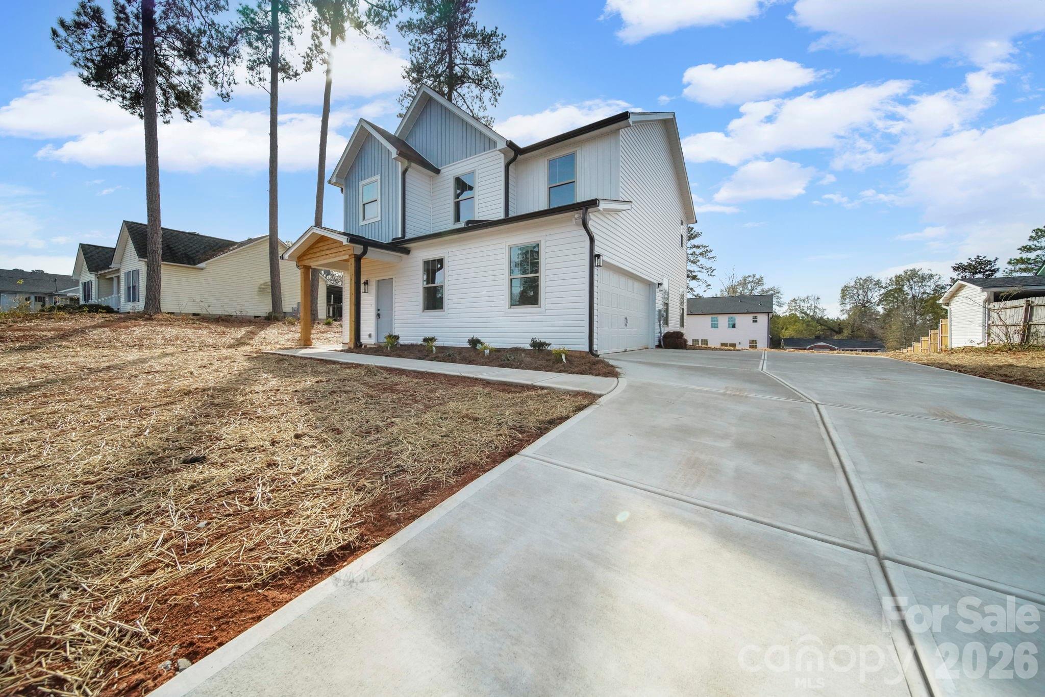 1220 Morven Road Wadesboro, NC 28170 - Photo 4 of 17 a view of a house with a patio
