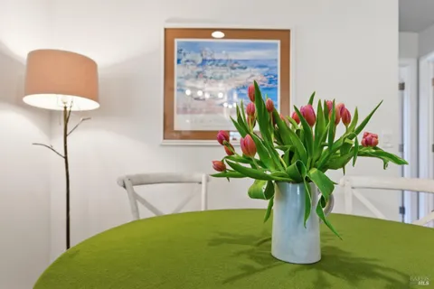 a vase of flowers sitting on a table