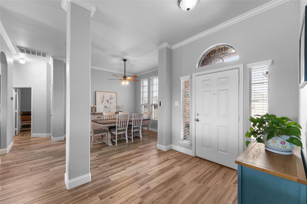 102 Avery Lane Fate, TX 75189 - Photo 3 of 30 a view of a dining room with hardwood floor