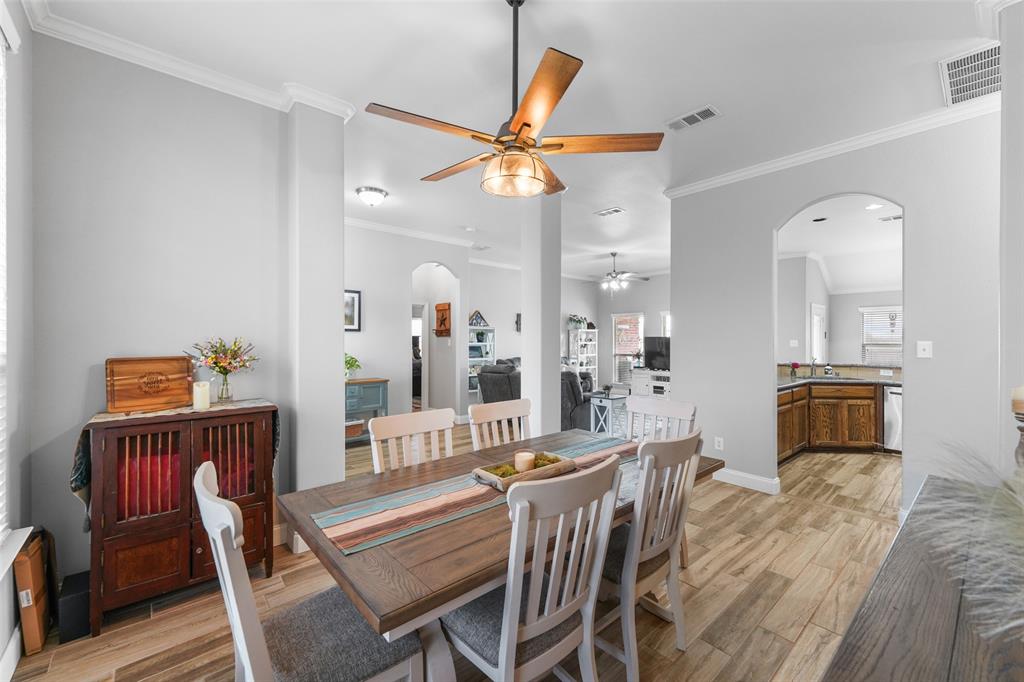 102 Avery Lane Fate, TX 75189 - Photo 5 of 30 a dining room with furniture and window