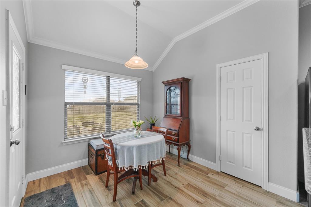 102 Avery Lane Fate, TX 75189 - Photo 9 of 30 a view of a dining room with furniture window and outside view