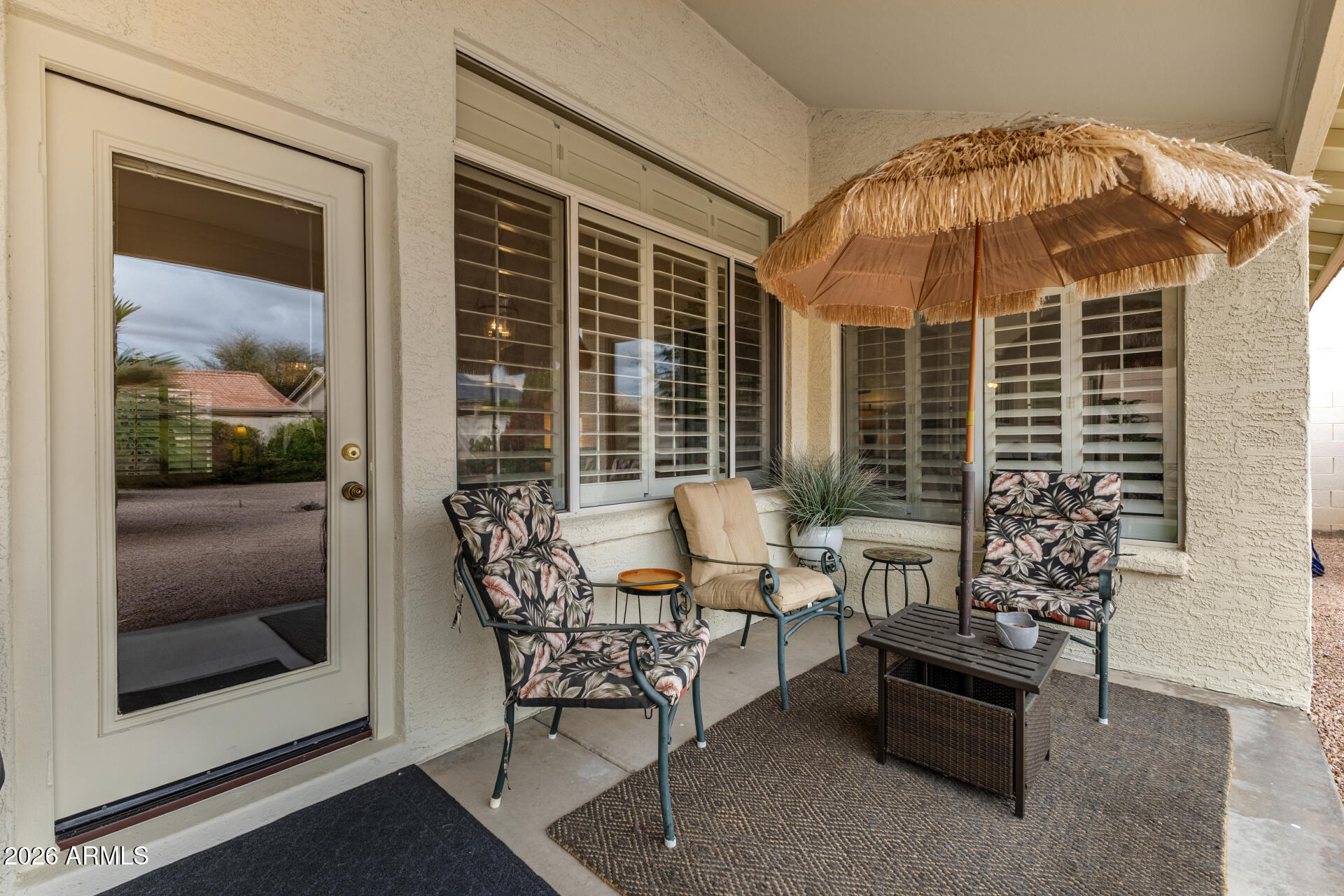 15764 Piccadilly Road Goodyear, AZ 85395 - Photo 26 of 31 a dining room with furniture and window