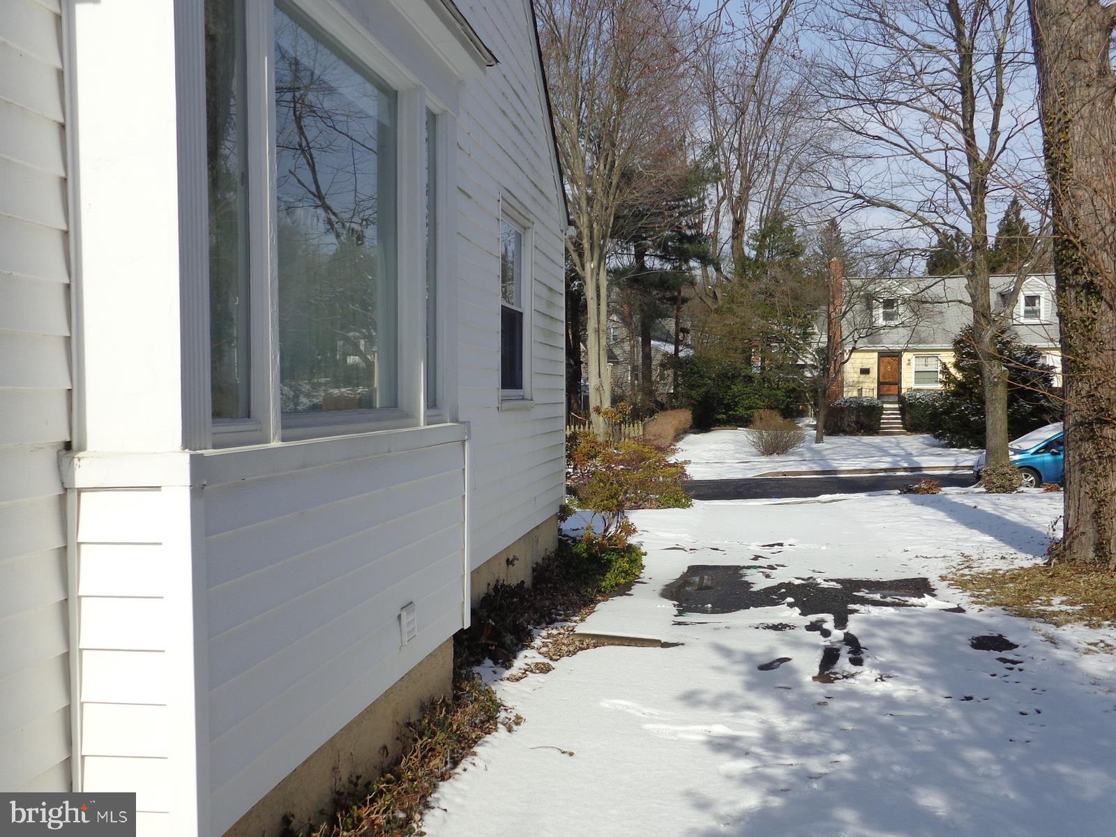 413 Brook Road Baltimore, MD 21286 - Photo 28 of 30 Side of house (snow covered driveway)