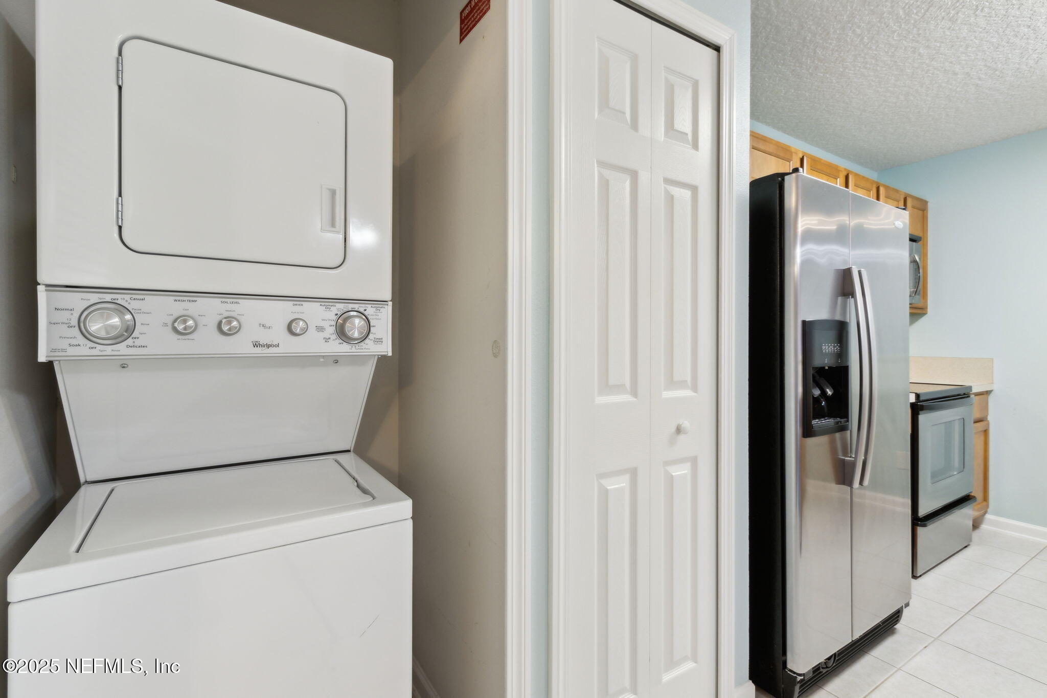 3700 Kirkpatrick Circle, Unit 811 Jacksonville, FL 32210 - Photo 17 of 29 a utility room with dryer and washer