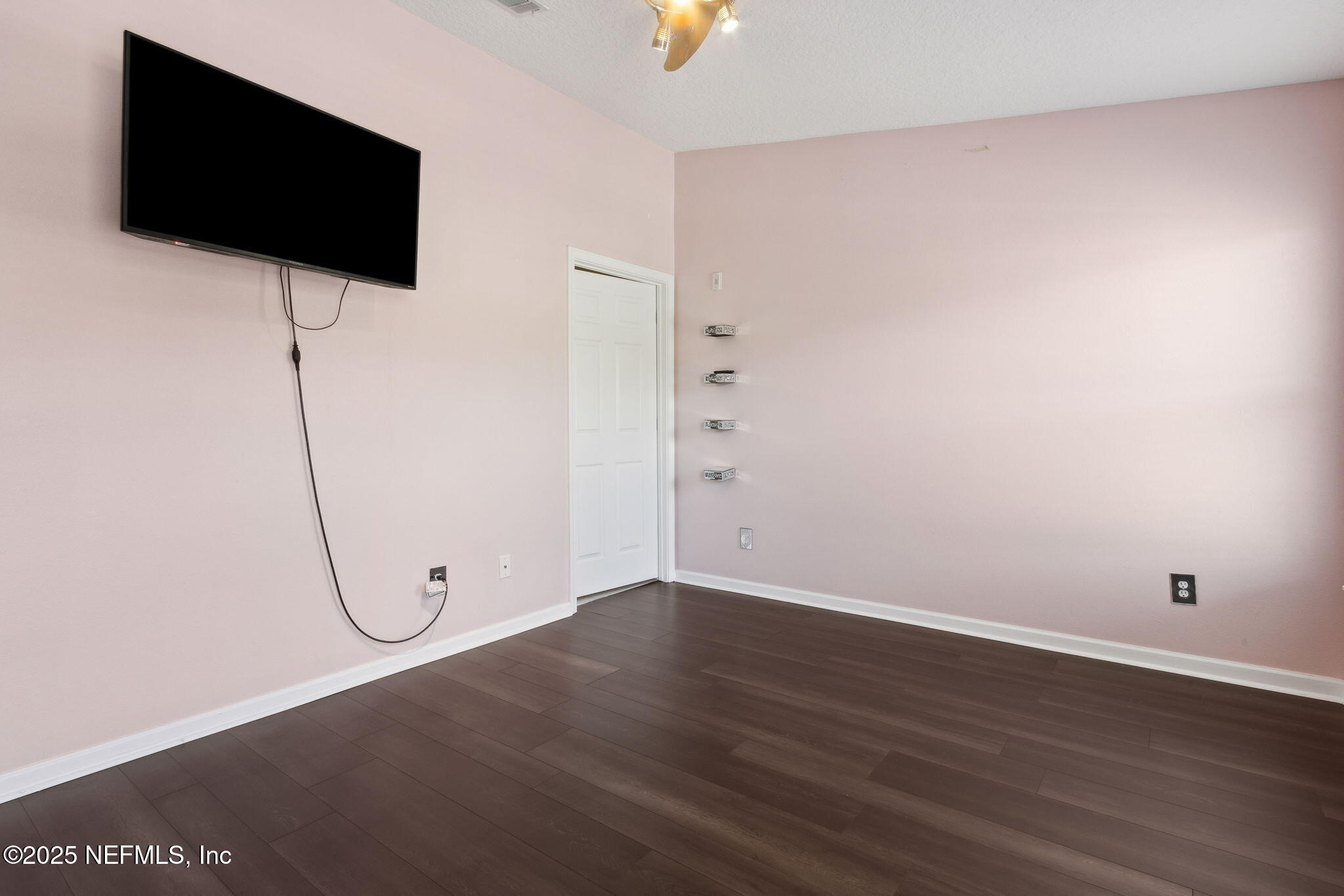 3700 Kirkpatrick Circle, Unit 811 Jacksonville, FL 32210 - Photo 19 of 29 a view of a room with wooden floor and windows
