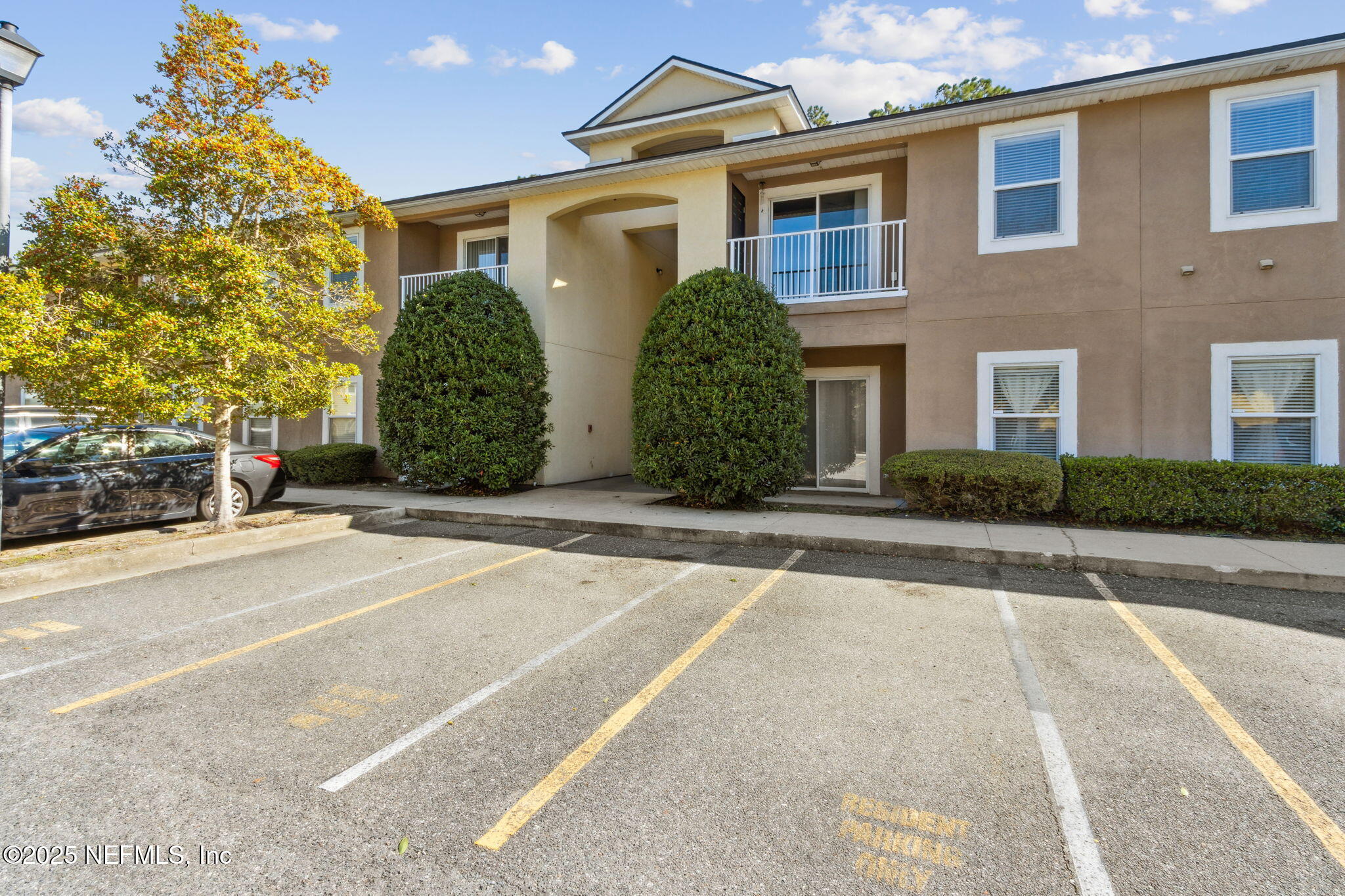 3700 Kirkpatrick Circle, Unit 811 Jacksonville, FL 32210 - Photo 2 of 29 a view of a white house with a street
