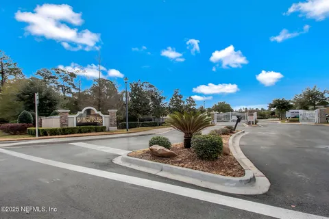 a view of a street with a houses