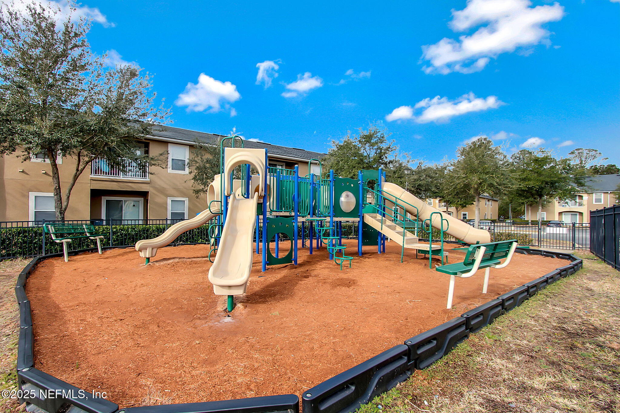 3700 Kirkpatrick Circle, Unit 811 Jacksonville, FL 32210 - Photo 29 of 29 a view of a swimming pool with a patio and a yard