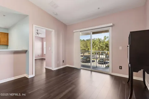 a view of a room with wooden floor and walls