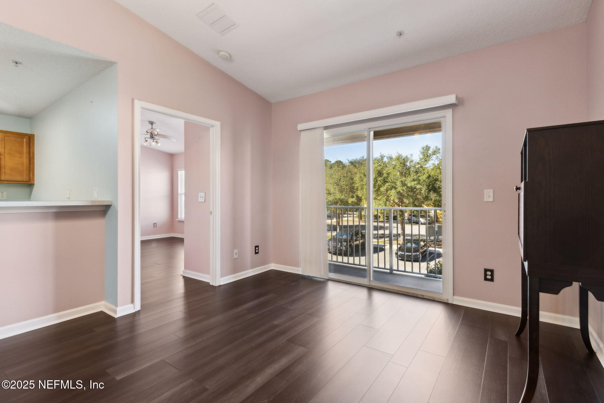 3700 Kirkpatrick Circle, Unit 811 Jacksonville, FL 32210 - Photo 7 of 29 a view of a room with wooden floor and walls