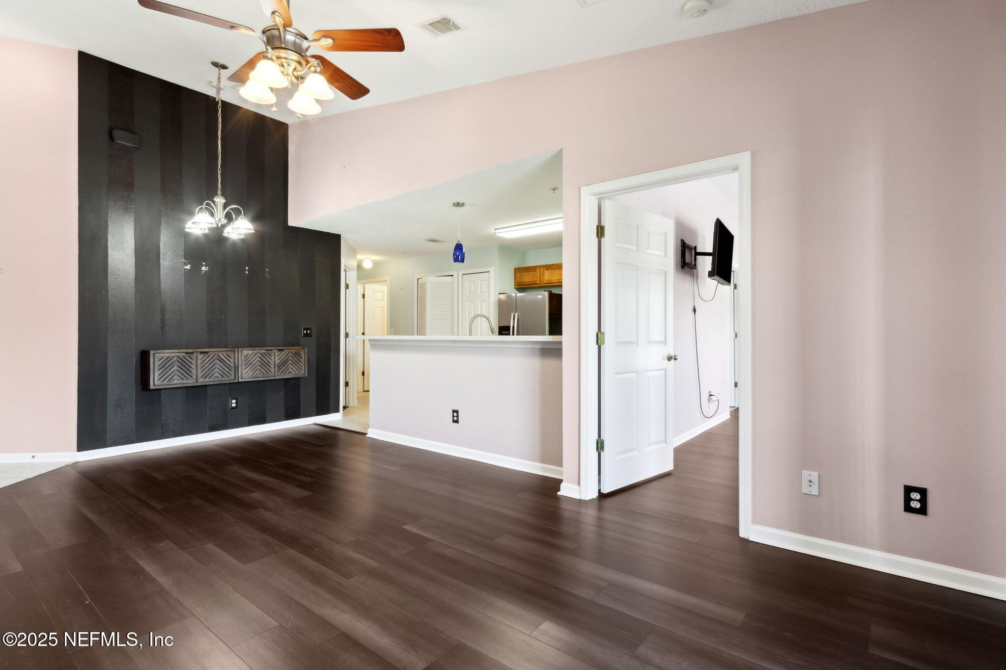3700 Kirkpatrick Circle, Unit 811 Jacksonville, FL 32210 - Photo 10 of 29 a view of a hallway with wooden floor