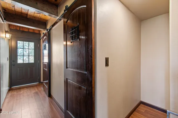 a bathroom with a granite countertop toilet sink and shower