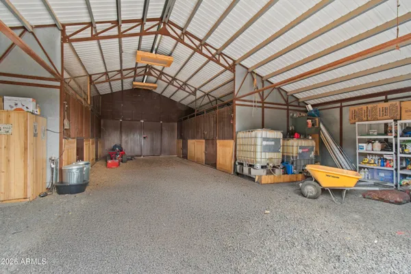 a view of a livingroom with furniture and stairs