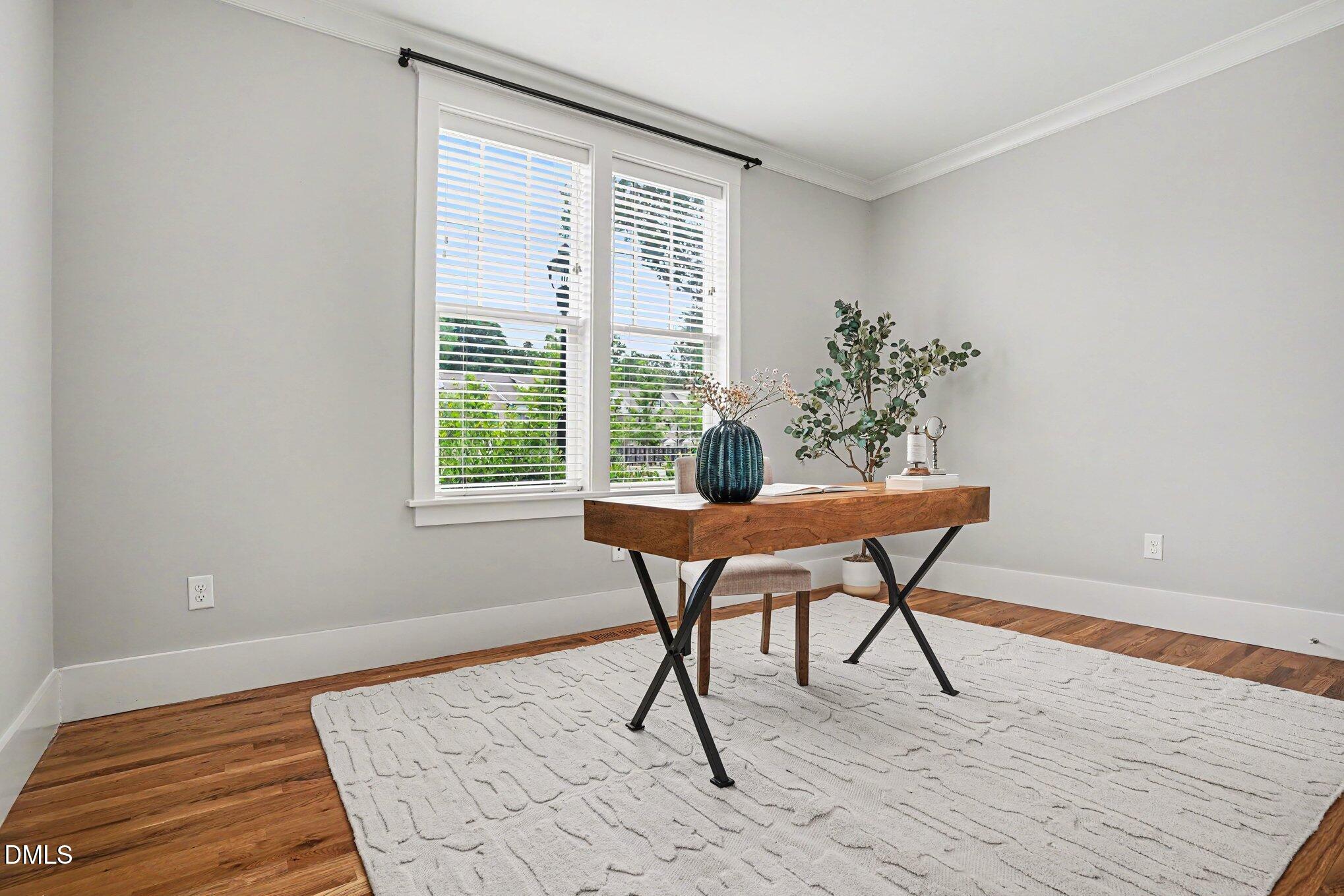 824 Watercolor Way Durham, NC 27713 - Photo 10 of 28 a workspace room with furniture and wooden floor