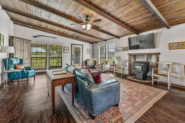 a kitchen with stainless steel appliances granite countertop a stove sink and cabinets