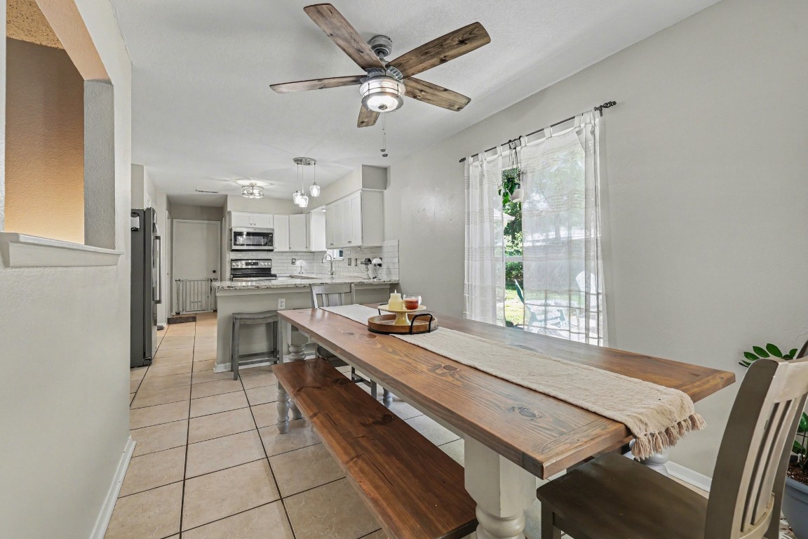 4306 Stallion Brook Lane Spring, TX 77388 - Photo 13 of 36 Informal dining open to living room & kitchen