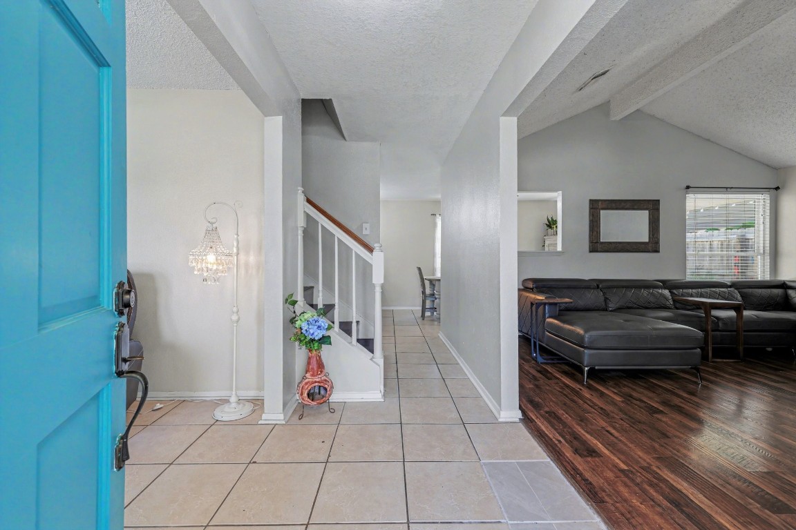 4306 Stallion Brook Lane Spring, TX 77388 - Photo 5 of 36 Entry and landing area, casual living to the right and formal dining/living to the left