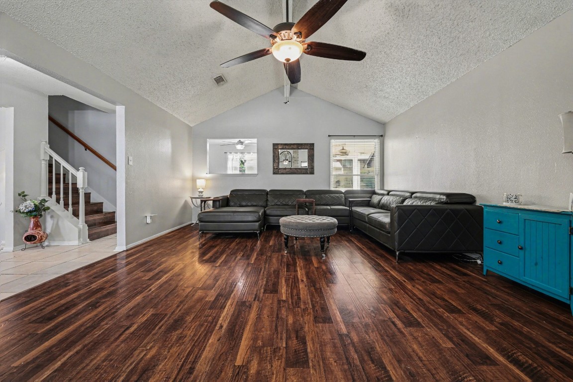 4306 Stallion Brook Lane Spring, TX 77388 - Photo 8 of 36 Living room with vaulted ceilings and gas fireplace