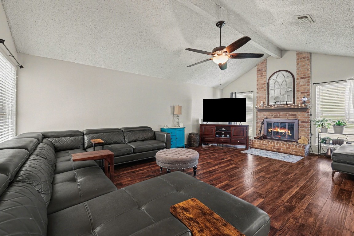 4306 Stallion Brook Lane Spring, TX 77388 - Photo 9 of 36 Living room with vaulted ceilings and gas fireplace