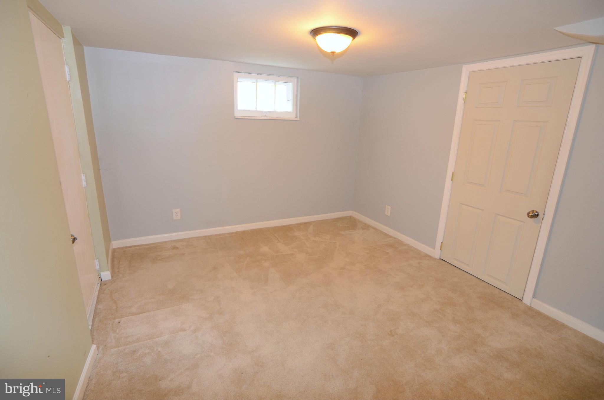 238 Meadow Road Pasadena, MD 21122 - Photo 25 of 30 Lower Level Rec Room