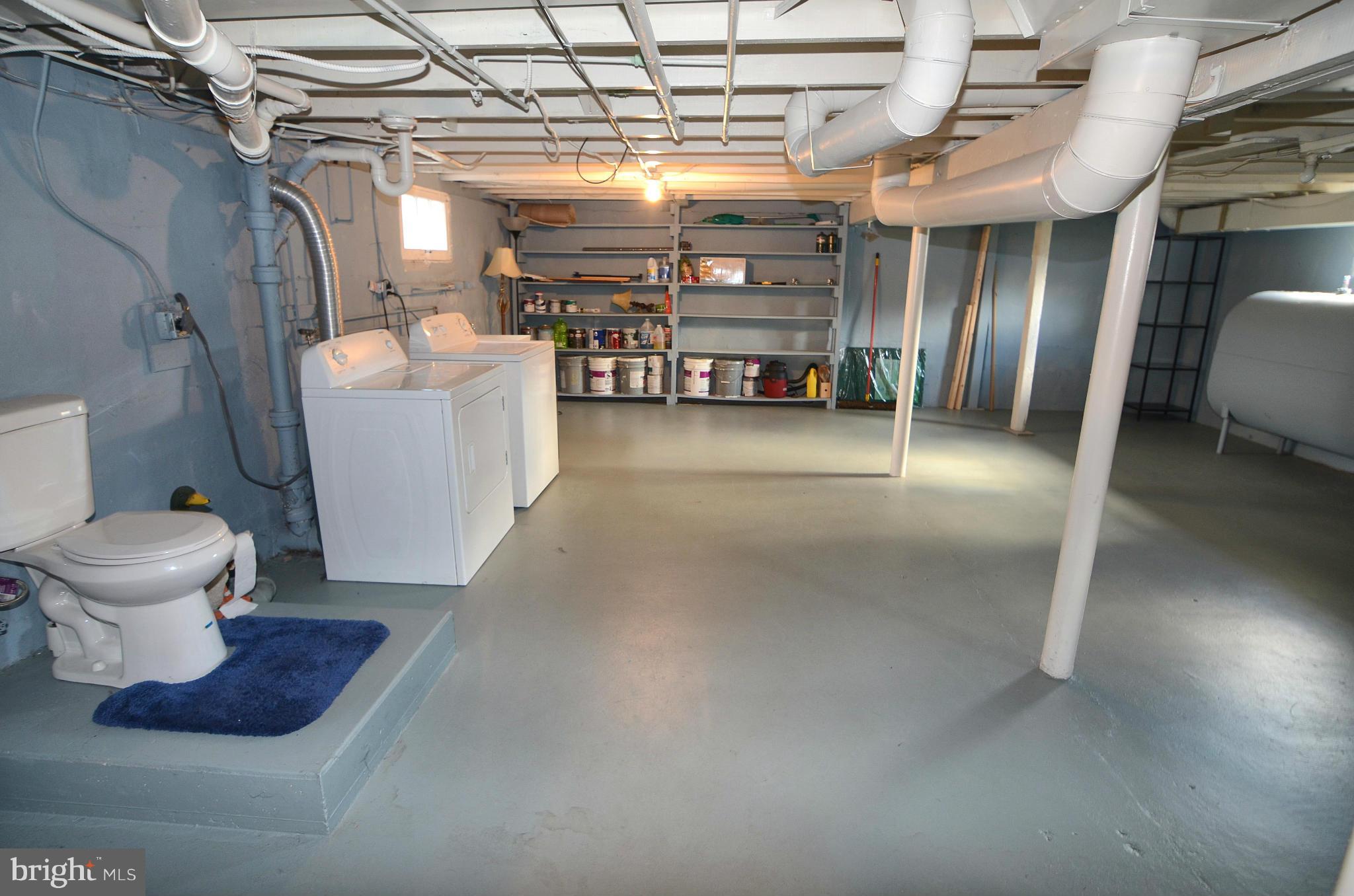 238 Meadow Road Pasadena, MD 21122 - Photo 27 of 30 Large Laundry and Storage Area