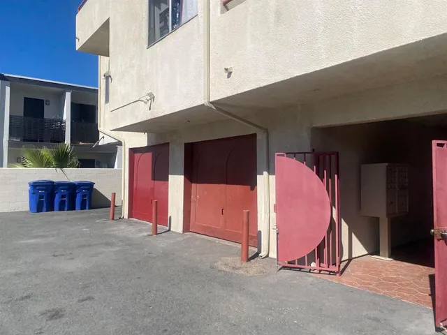 a view of gallery with wooden floor