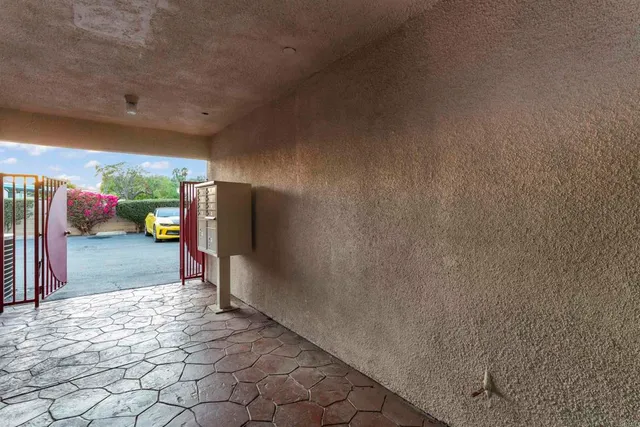 a view of washer and dryer with cabinet