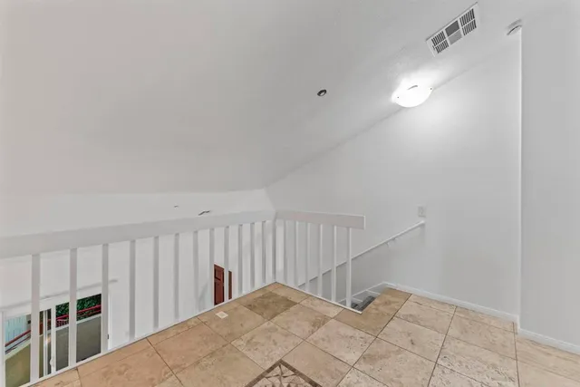 a view of a hallway with closet