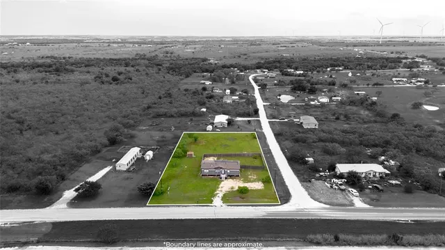 an aerial view of a backyard