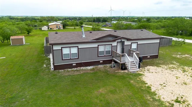 a house view with a garden space