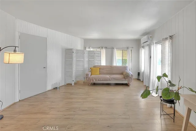 a view of livingroom with hardwood floor and window
