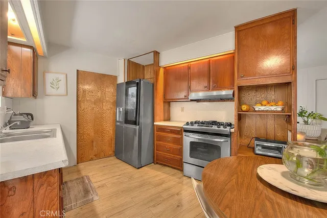 a view of a kitchen and dining room