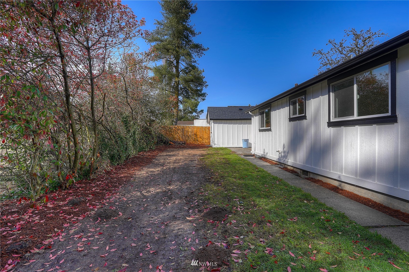 8126 Canyon Road East Puyallup, WA 98371 - Photo 11 of 37 a front view of a house with garden