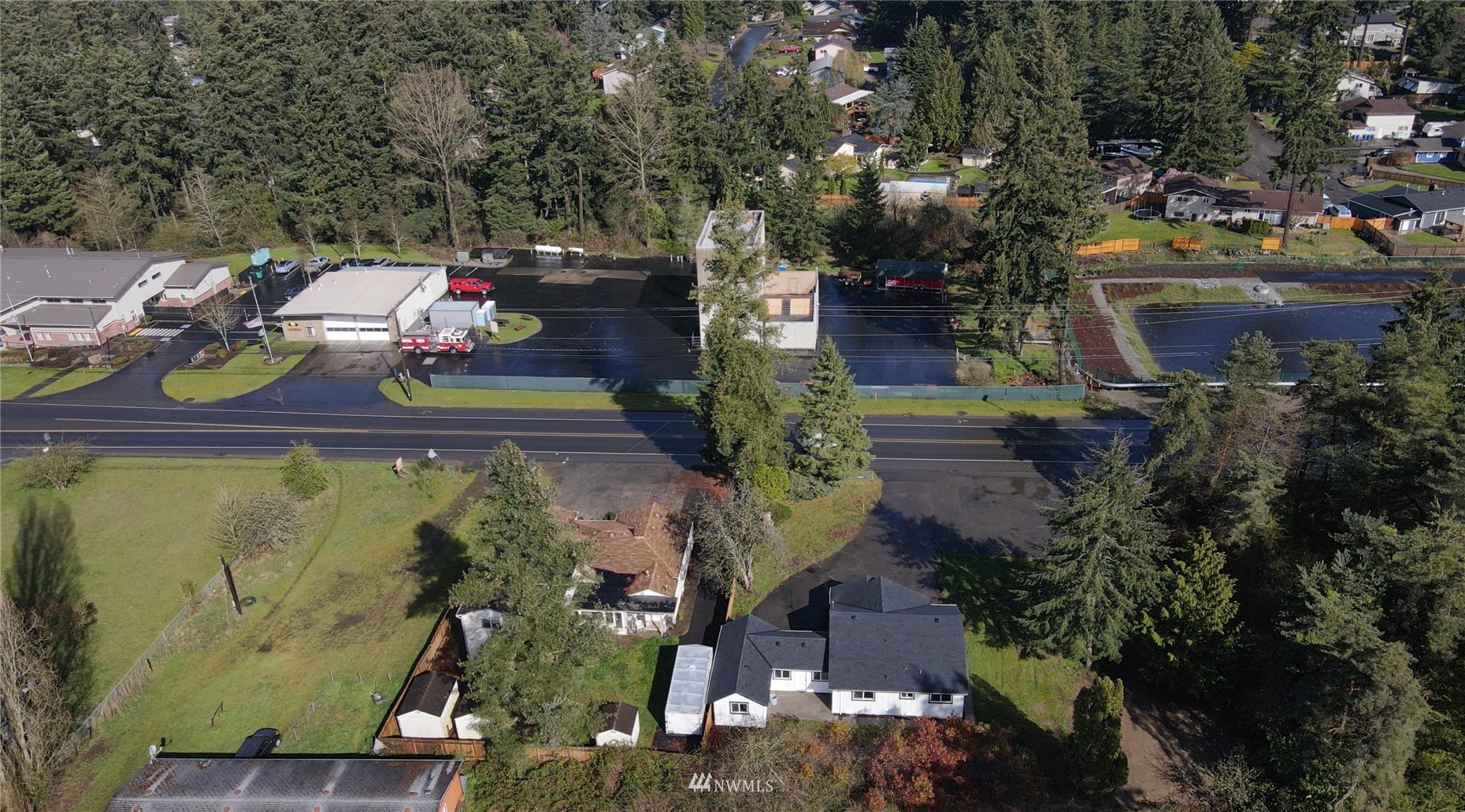 8126 Canyon Road East Puyallup, WA 98371 - Photo 34 of 37 an aerial view of a house with a garden