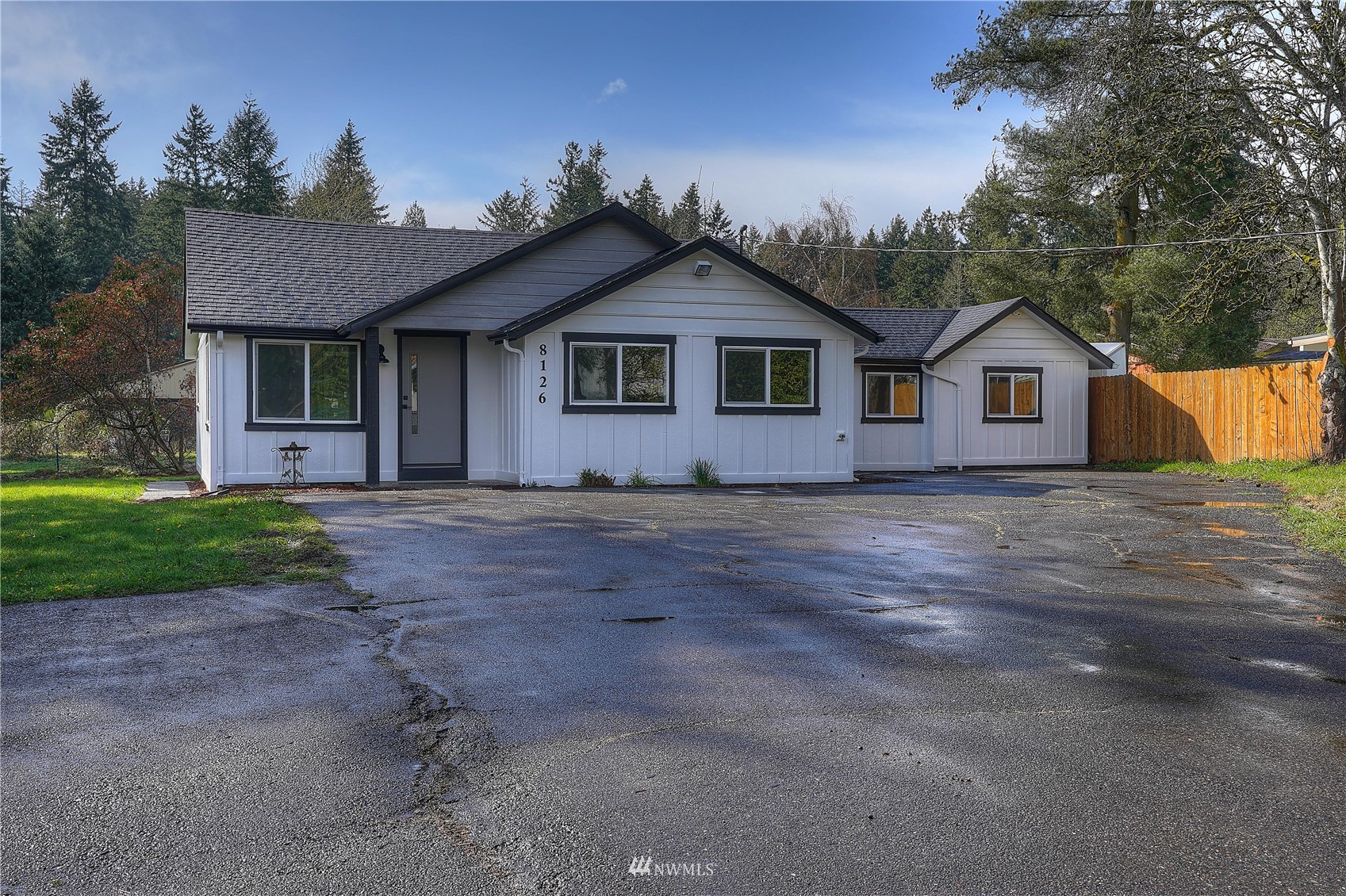 8126 Canyon Road East Puyallup, WA 98371 - Photo 4 of 37 a view of front of a house with a yard