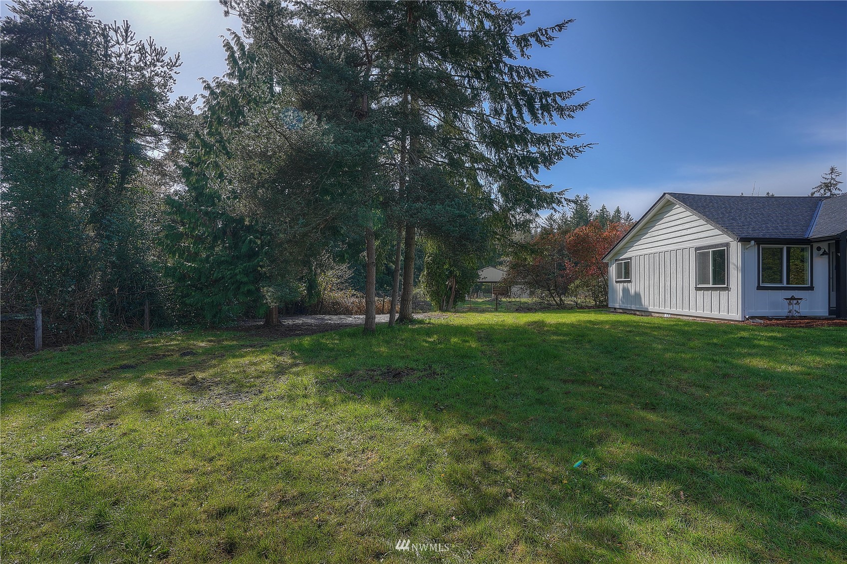 8126 Canyon Road East Puyallup, WA 98371 - Photo 8 of 37 a view of a house with a yard